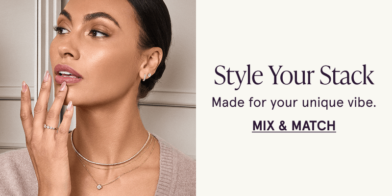 A model wearing gold diamond jewelry. Style your stack. Click here to mix and match