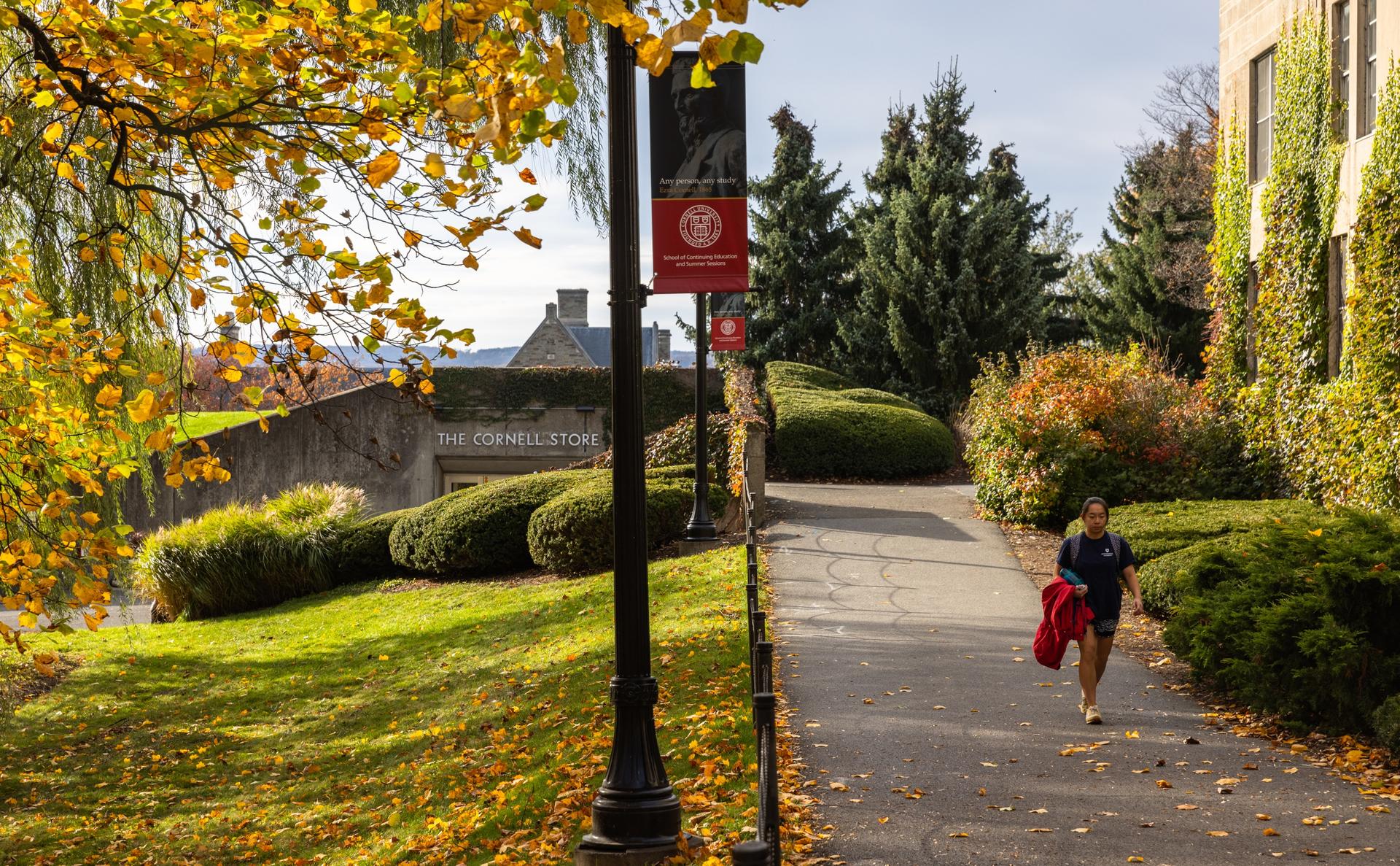 A Cornell University student walks through campus on November 3, 2023 in Ithaca, New York.