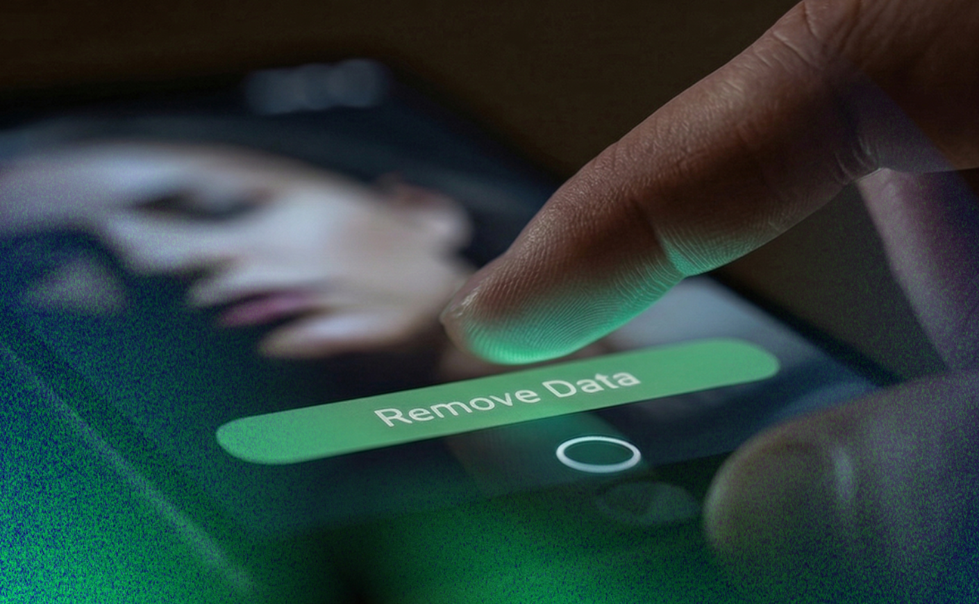 Person clicking a Remove Data button on a smartphone