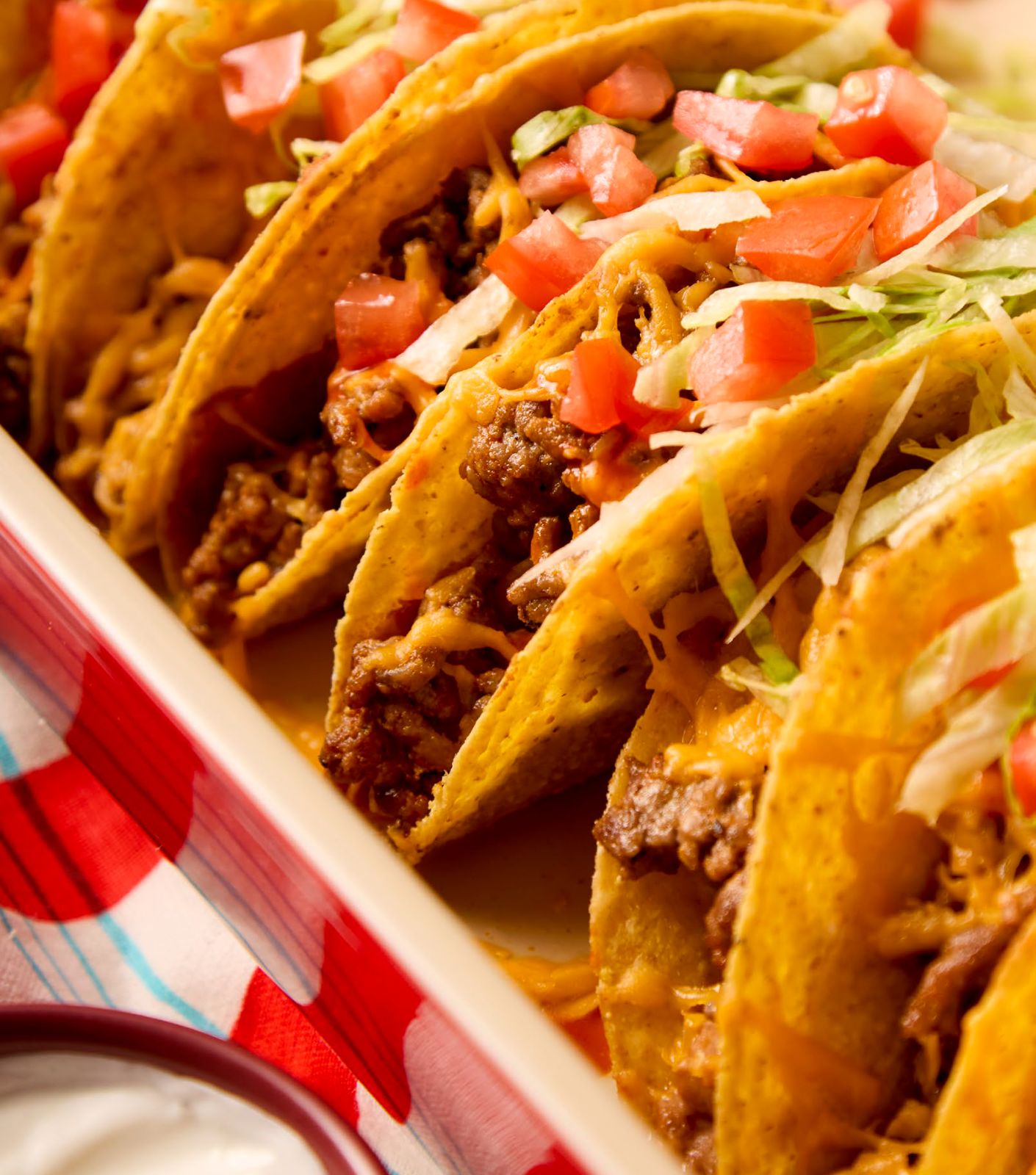 A baking dish of baked beef tacos.