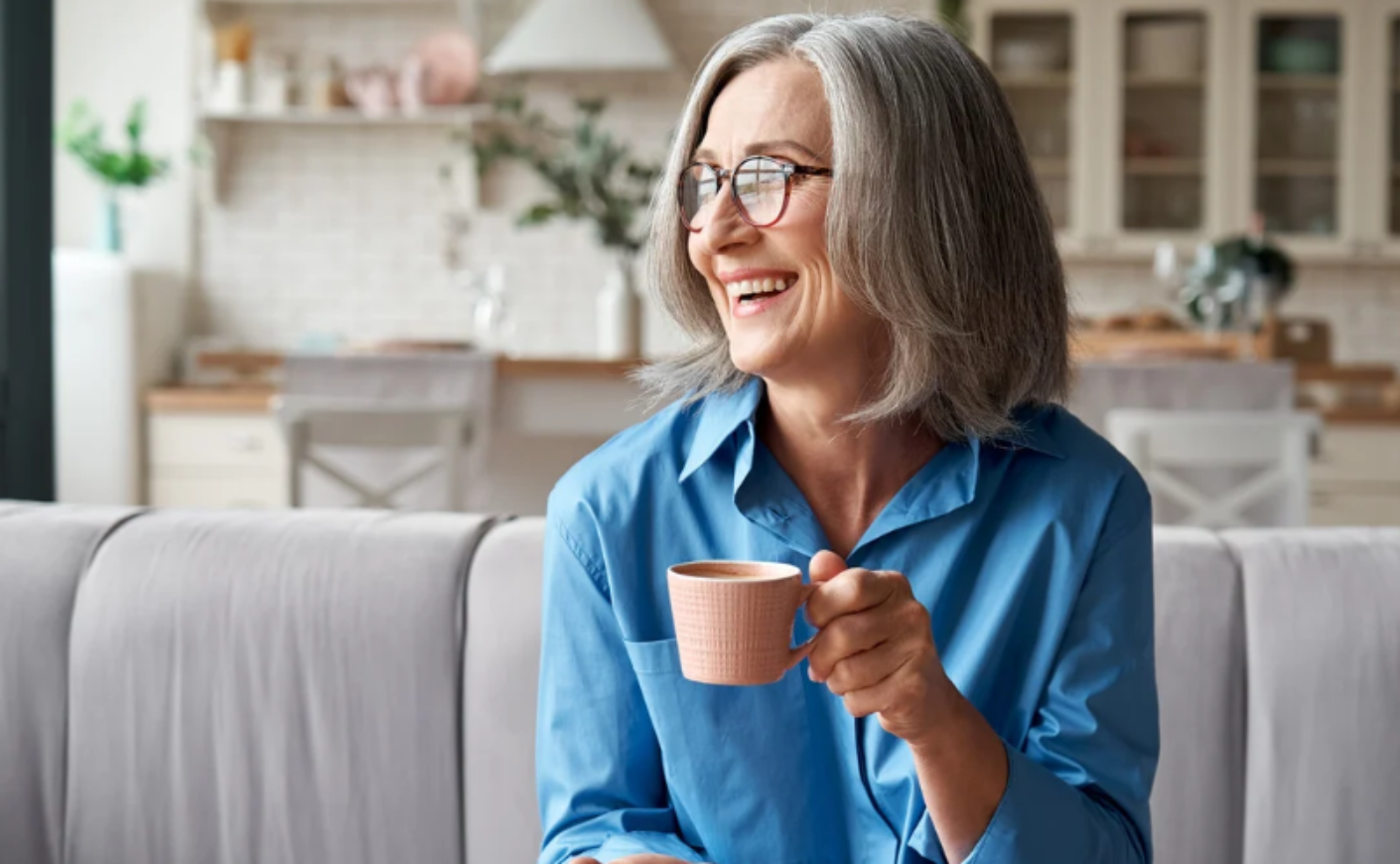 Older woman drinking coffee