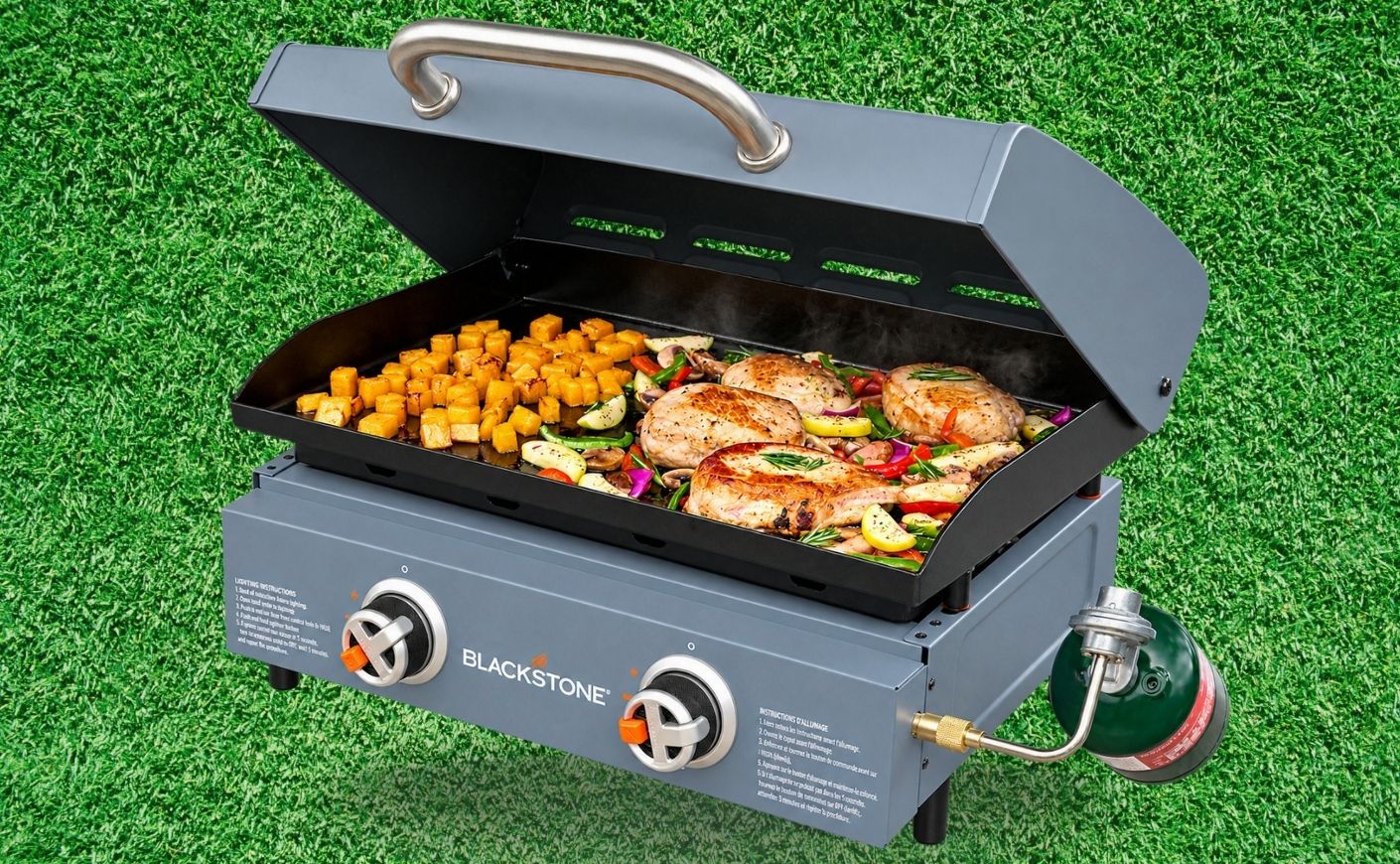 A Blackstone griddle filled with food.