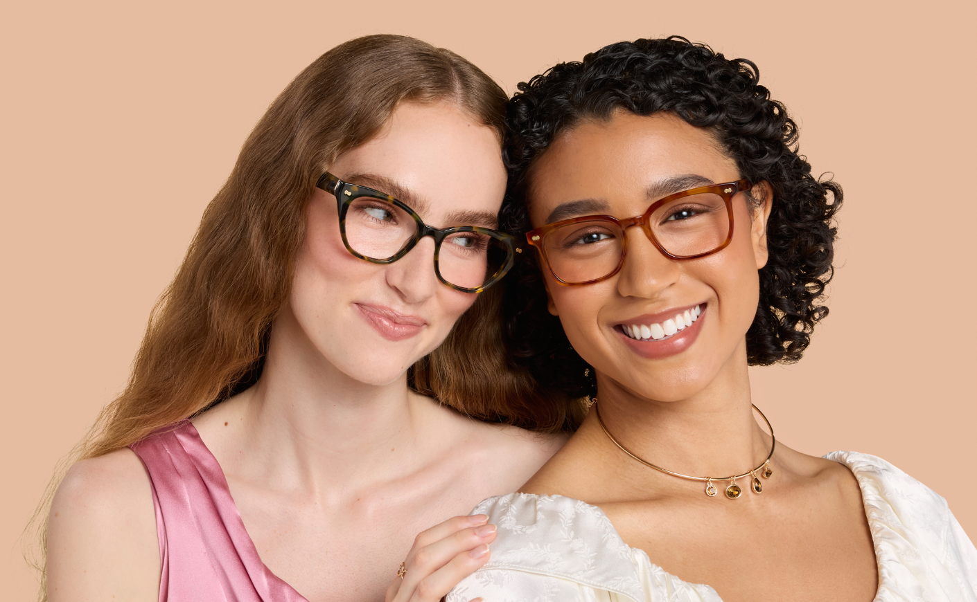 Two women wearing eye glasses