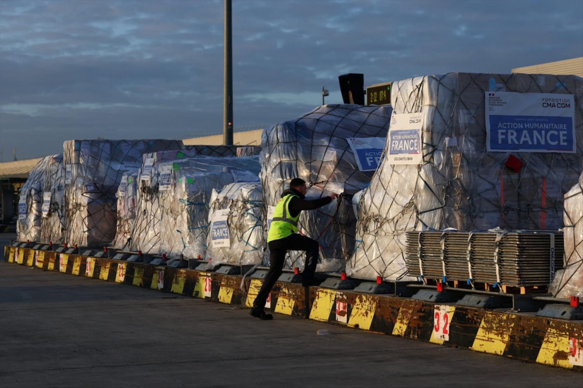 Worldwide Flight Services personnel prepare humanitarian aid packages at Paris‑Charles de Gaulle Airport, France, on March 12, 2026.  