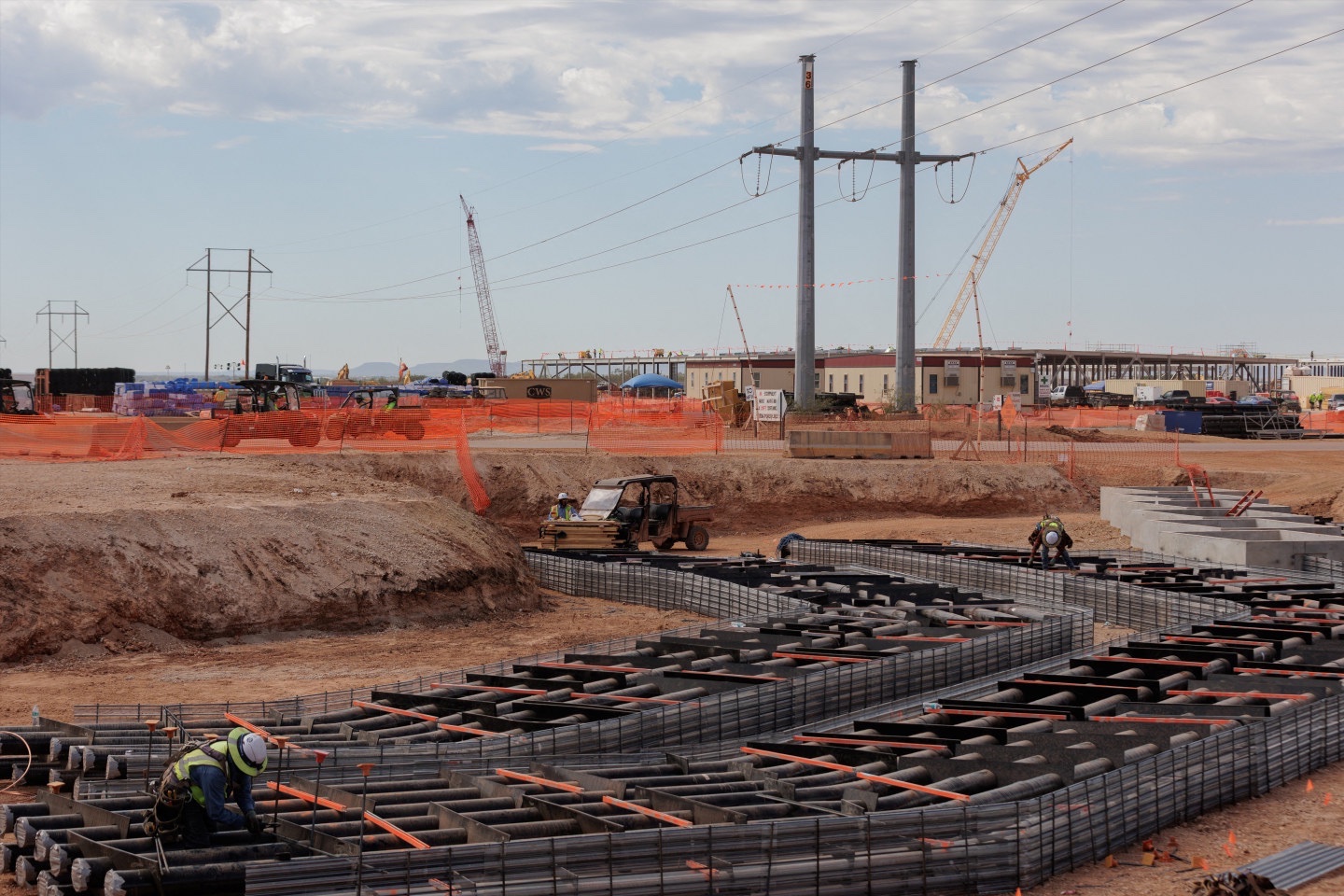 Conduits for fiber to connect superclusters of data centers are under construction during a tour of the OpenAI data center in Abilene, Texas, U.S., September 23, 2025. 