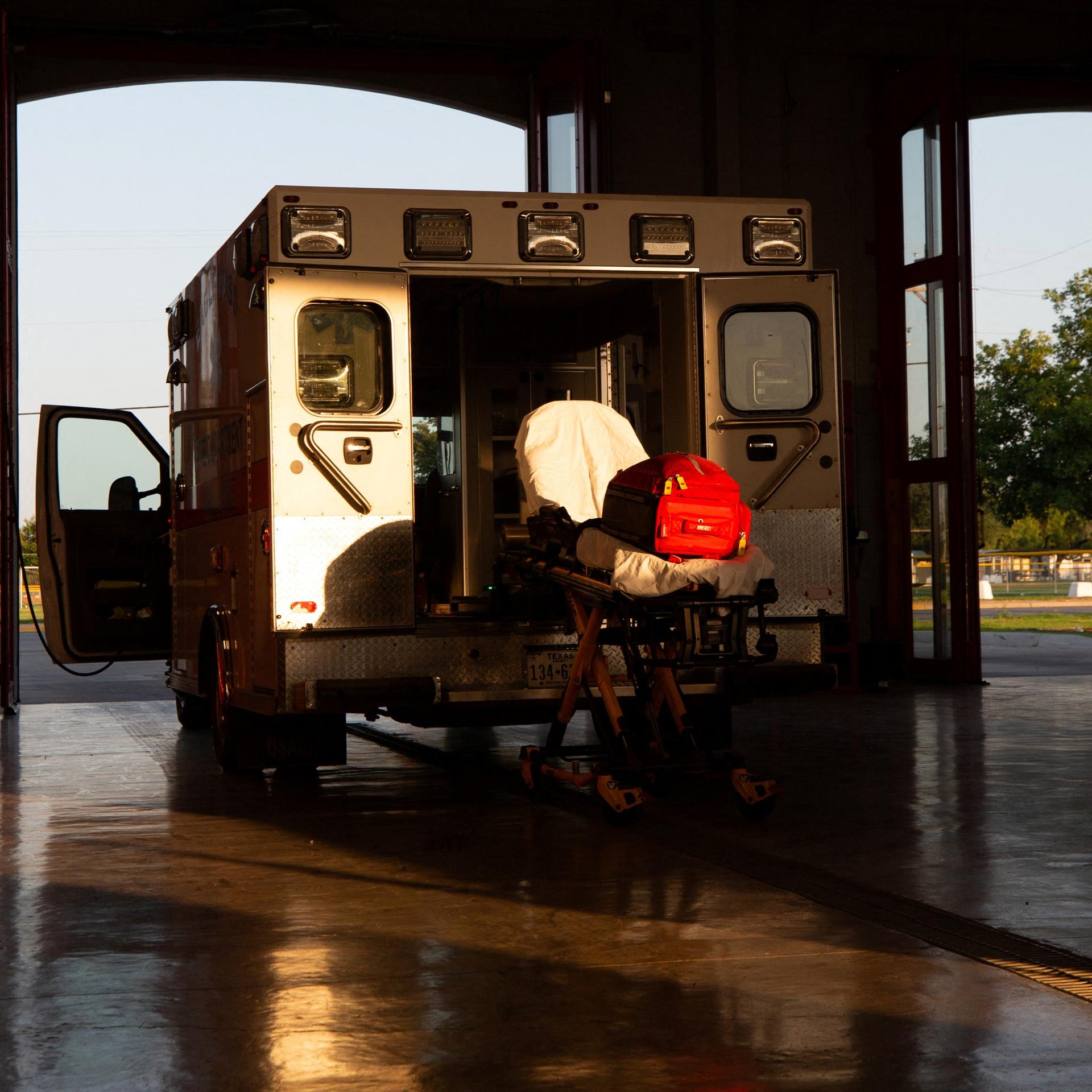 An ambulance is pictured as firefighters clean and restock medical supplies in ambulances and other emergency vehicles and equipment, Eagle Pass, Texas, on July 09, 2023.