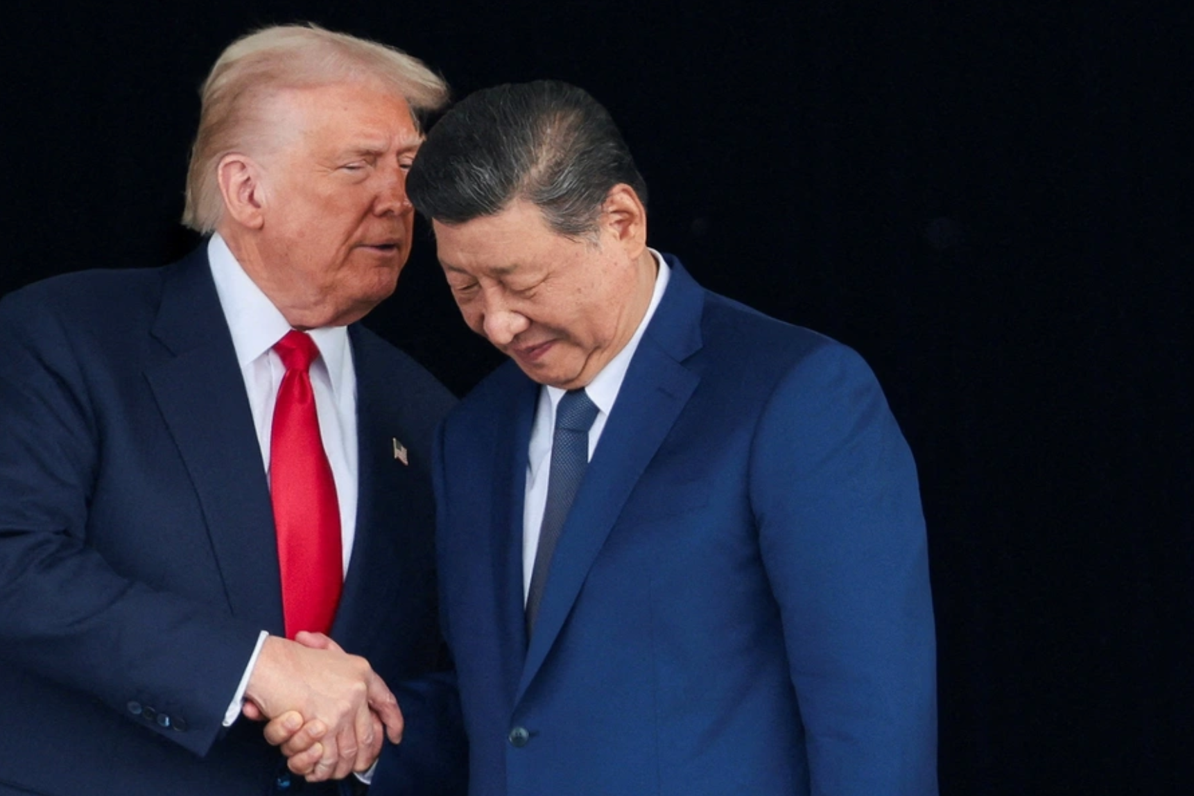 U.S. President Donald Trump and Chinese President Xi Jinping talk as they leave after a bilateral meeting at Gimhae International Airport, on the sidelines of the Asia-Pacific Economic Cooperation (APEC) summit, in Busan, South Korea, October 30, 2025. Evelyn Hockstein/Reuters