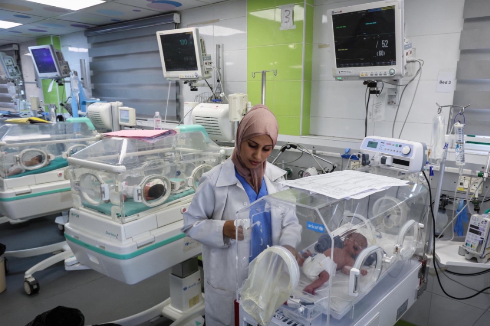 A nurse looks after a baby in an incubator at the maternity ward of Nasser hospital, in Khan Younis in the southern Gaza Strip, on September 25, 2025.