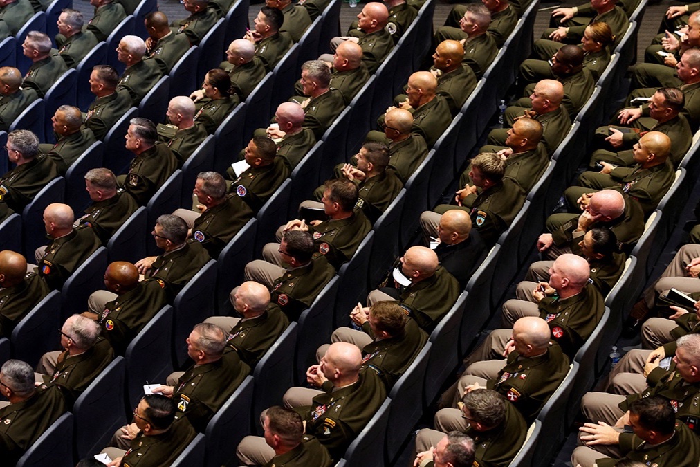 Members of the military attend a meeting convened by U.S. Defense Secretary Pete Hegseth, at Marine Corps Base Quantico, in Quantico, Virginia, U.S., September 30, 2025. 