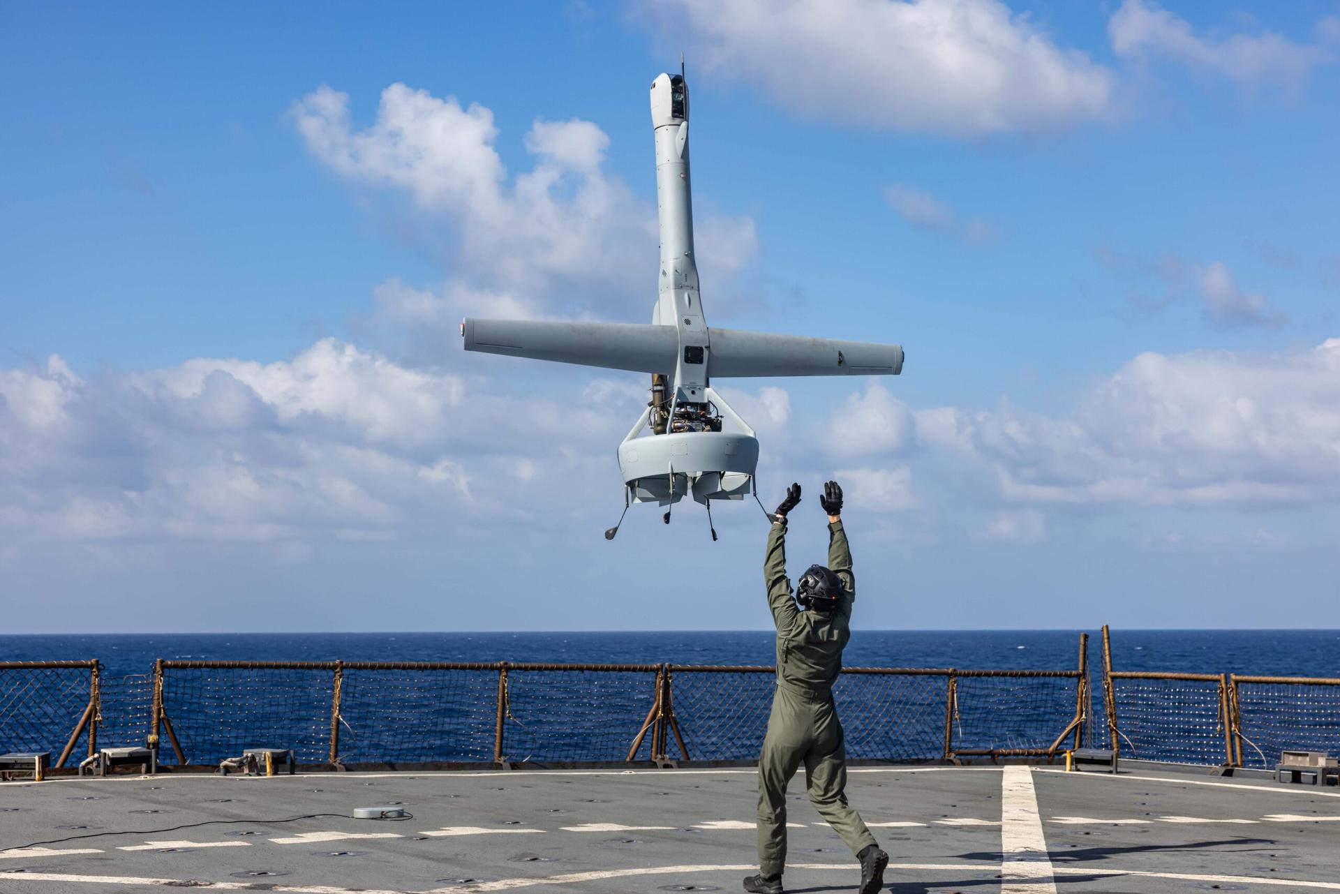 The deck of an aircraft carrier and blue sky. 