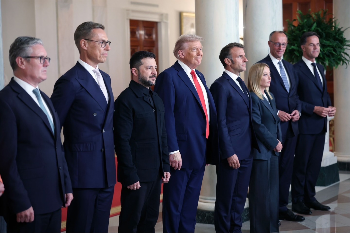 President Donald Trump and Ukrainian President Volodymyr Zelensky pose for a picture with European leaders following a meeting in the Oval Office at the White House on August 18, 2025 in Washington, D.C. 