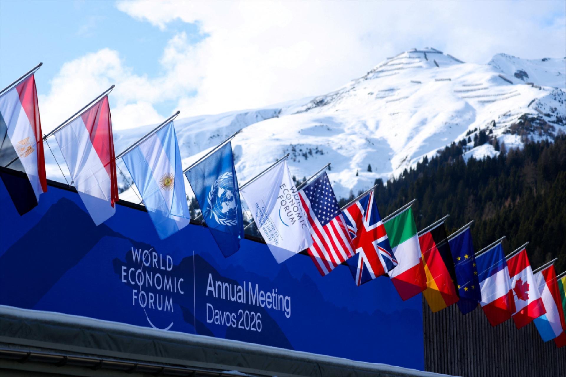 Flags flutter during the 56th annual World Economic Forum (WEF) meeting, in Davos, Switzerland, January 19, 2026. REUTERS/Denis Balibouse/File Photo