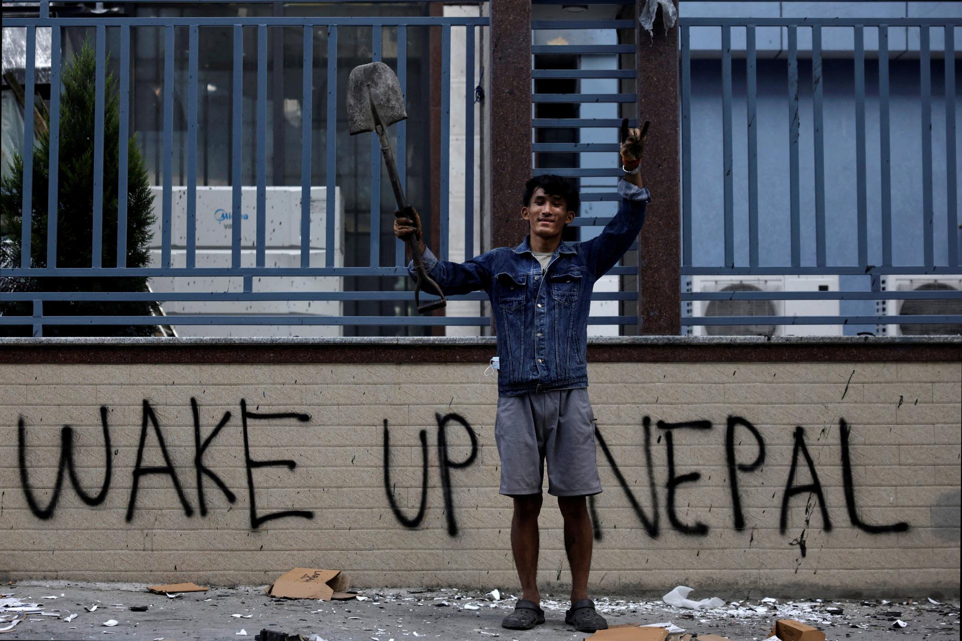 A Nepalese protestor takes part in a cleaning campaign following anti-corruption protests in Kathmandu, Nepal, September 10, 2025.