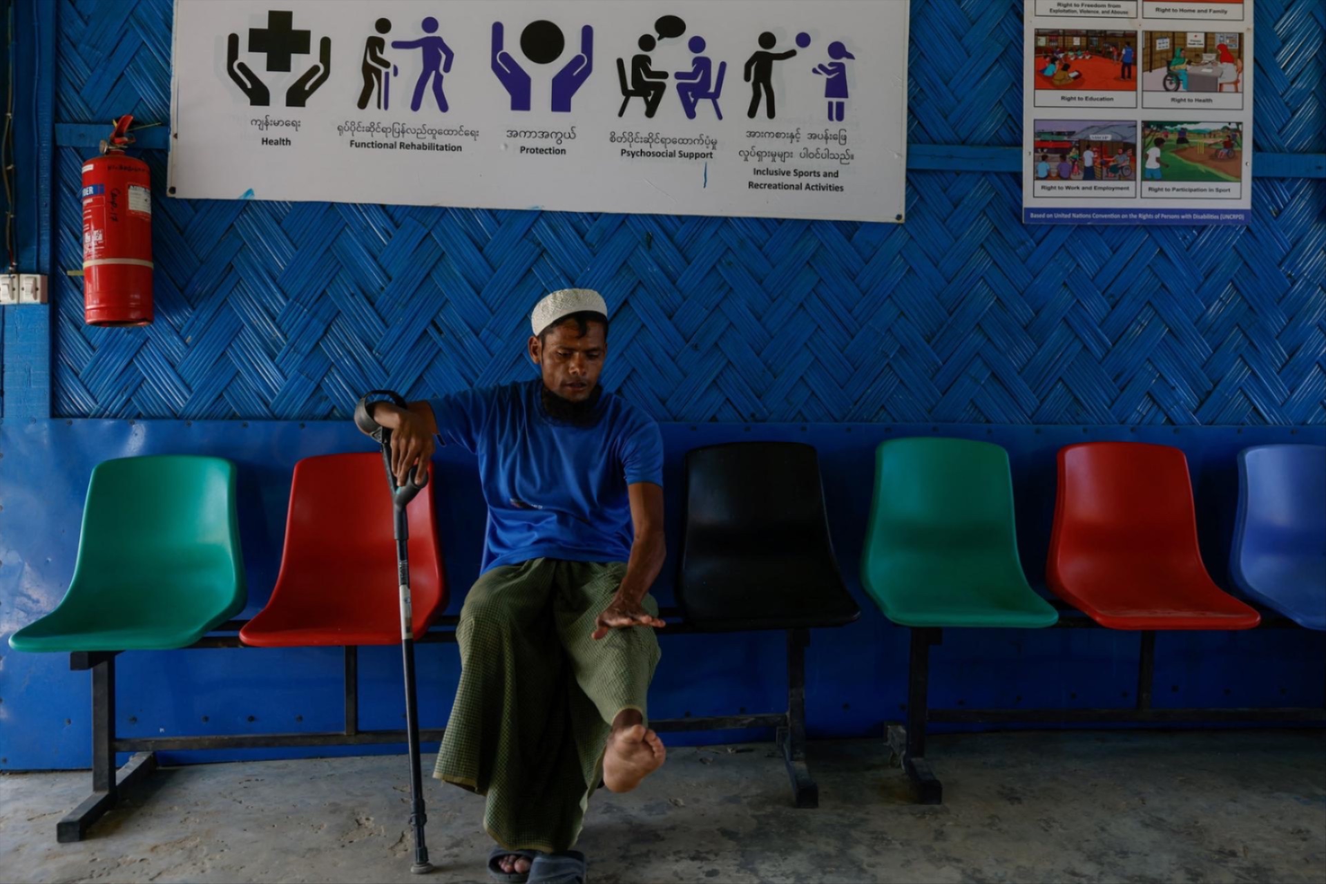 Shofiul Islam, 35, who has disabilities, shows his leg while visiting a facility funded by USAID, at the Rohingya refugee camp, in Cox's Bazar, Bangladesh, on March 16, 2025. 