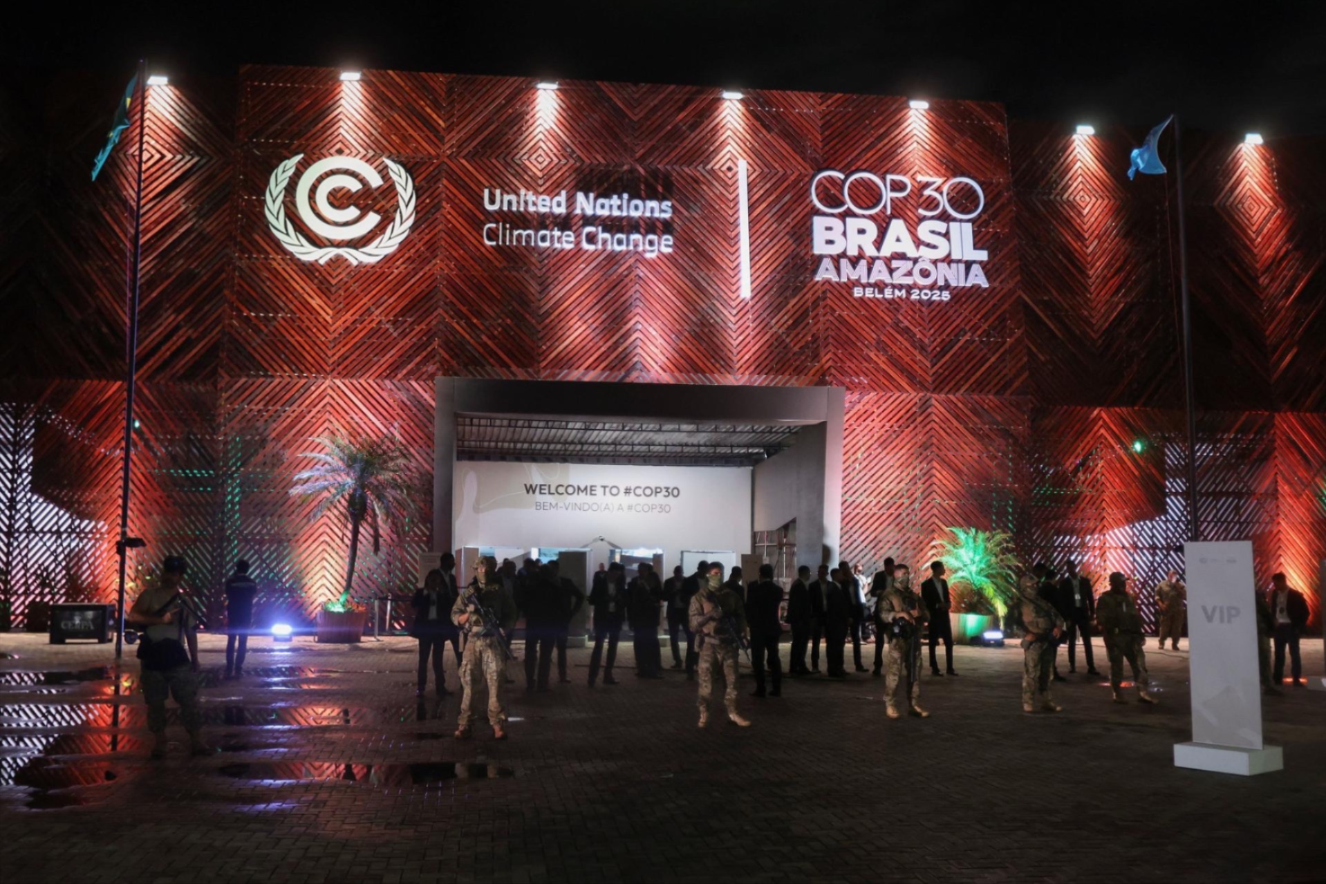 Security forces guard an entrance after demonstrators, including Indigenous people, forced their way into the venue hosting the UN Climate Change Conference (COP30), in Belem, Brazil, November 11, 2025.