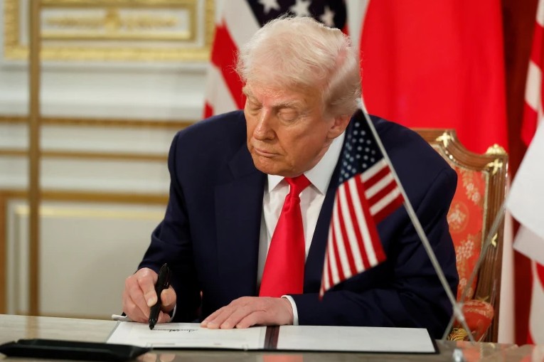 US President Donald Trump during a signing ceremony for a document on the implementation of the US Japan trade deal with Sanae Takaichi, Japan’s prime minister, not photographed, at Akasaka Palace state guest house in Tokyo, Japan, on Tuesday, Oct. 28, 2025. Kiyoshi Ota/Pool via REUTERS