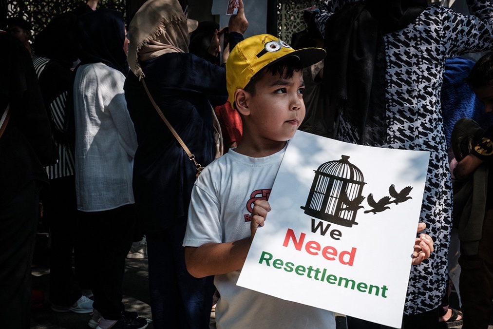 Afghan refugees and asylum seekers take part in a protest demanding resettlement assistance in Jakarta, Indonesia, July 21, 2025.
