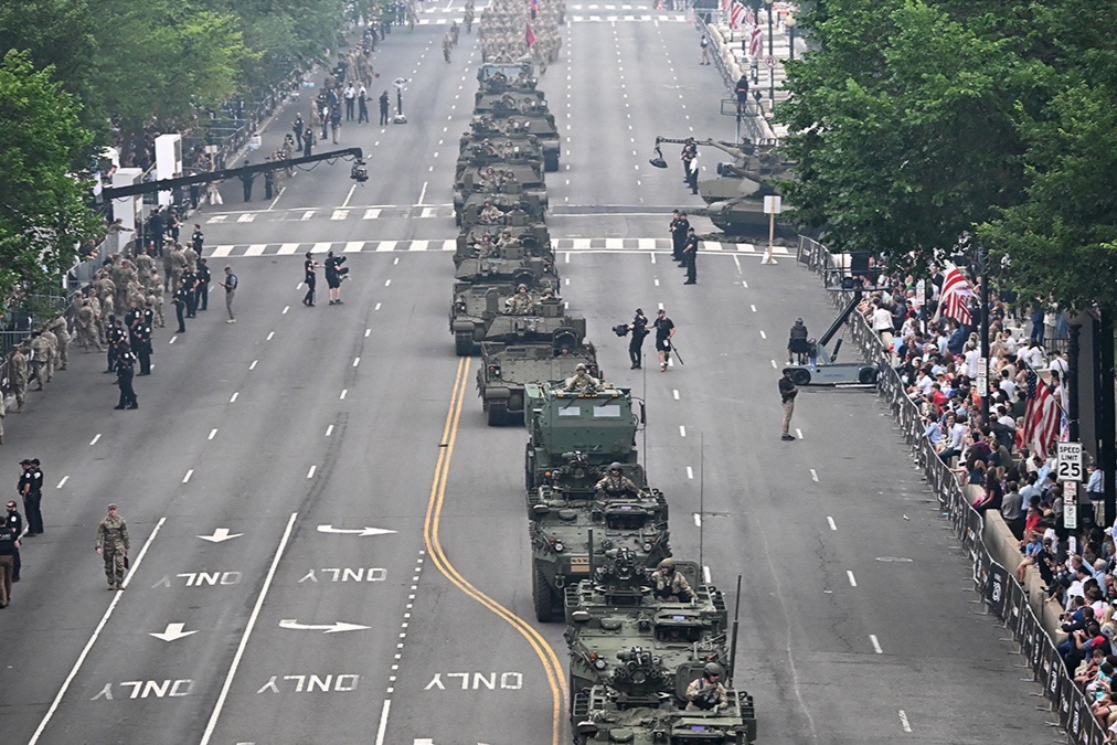Armored vehicles drive down the avenue during the Army 250th Anniversary Parade in Washington, DC, on June 14, 2025.