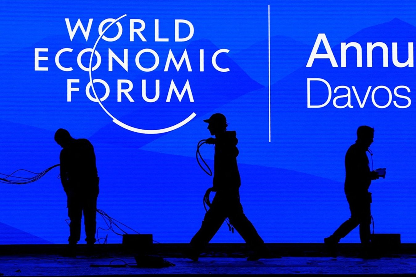 Staff members prepare the plenary room ahead of the World Economic Forum in Davos, Switzerland, January 18, 2025. Yves Herman/Reuters