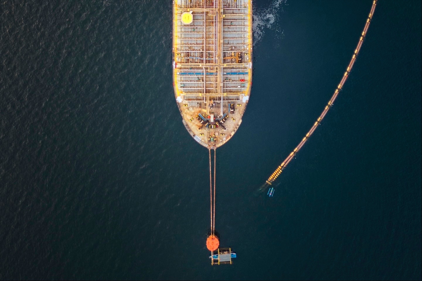 In an aerial view, the Panamanian-flagged Tiger Wings, carrying crude oil from Russia, is moored off the Petron oil refinery on April 1, 2026 in Limay, Bataan province, Philippines.