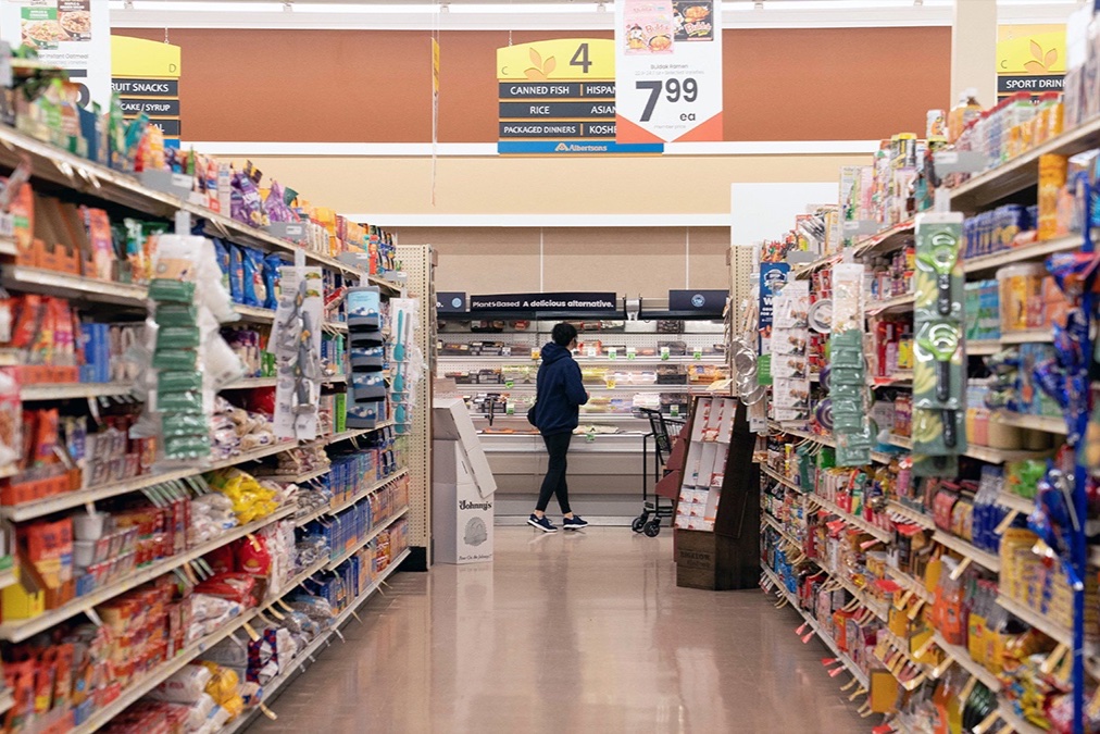 A food shopper browses for groceries ahead of the Thanksgiving Day holiday at an Albertsons supermarket in Redmond, Washington, on November 24.