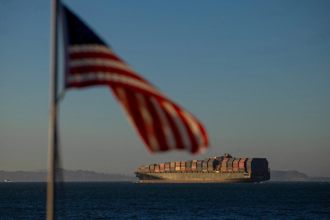 A cargo ship full of shipping containers departs the port of Oakland at the San Francisco Bay, California, U.S., August 4, 2025. 