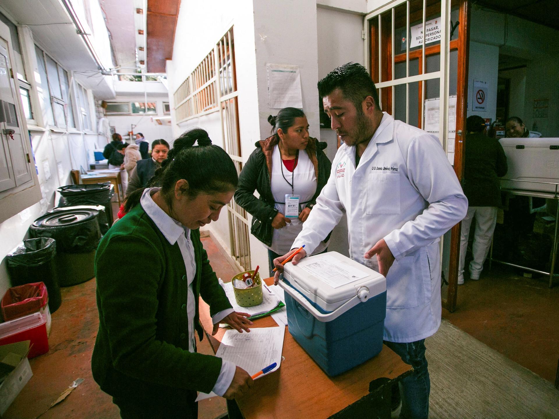 Community health workers prepare vaccines for a measles vaccination drive amid a surge in cases, in San Cristobal de Las Casas, Chiapas, Mexico, on February 25, 2026.