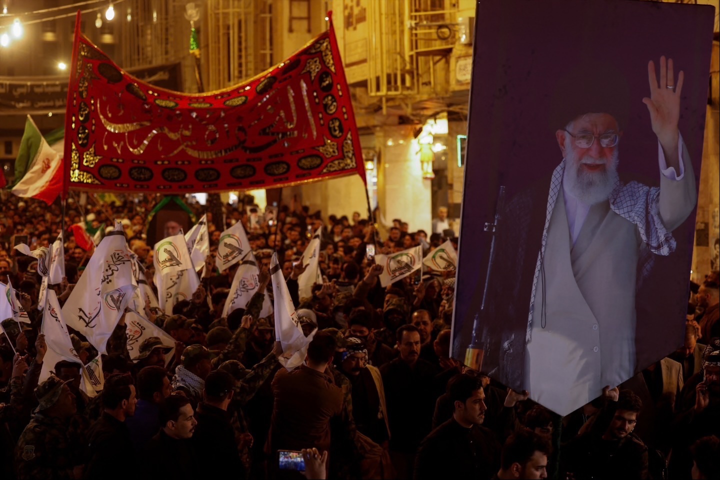 People attend a symbolic funeral procession for Iranian Supreme Leader Ayatollah Ali Khamenei, following his death in Israeli and U.S. airstrikes, in Najaf, Iraq March 3, 2026.