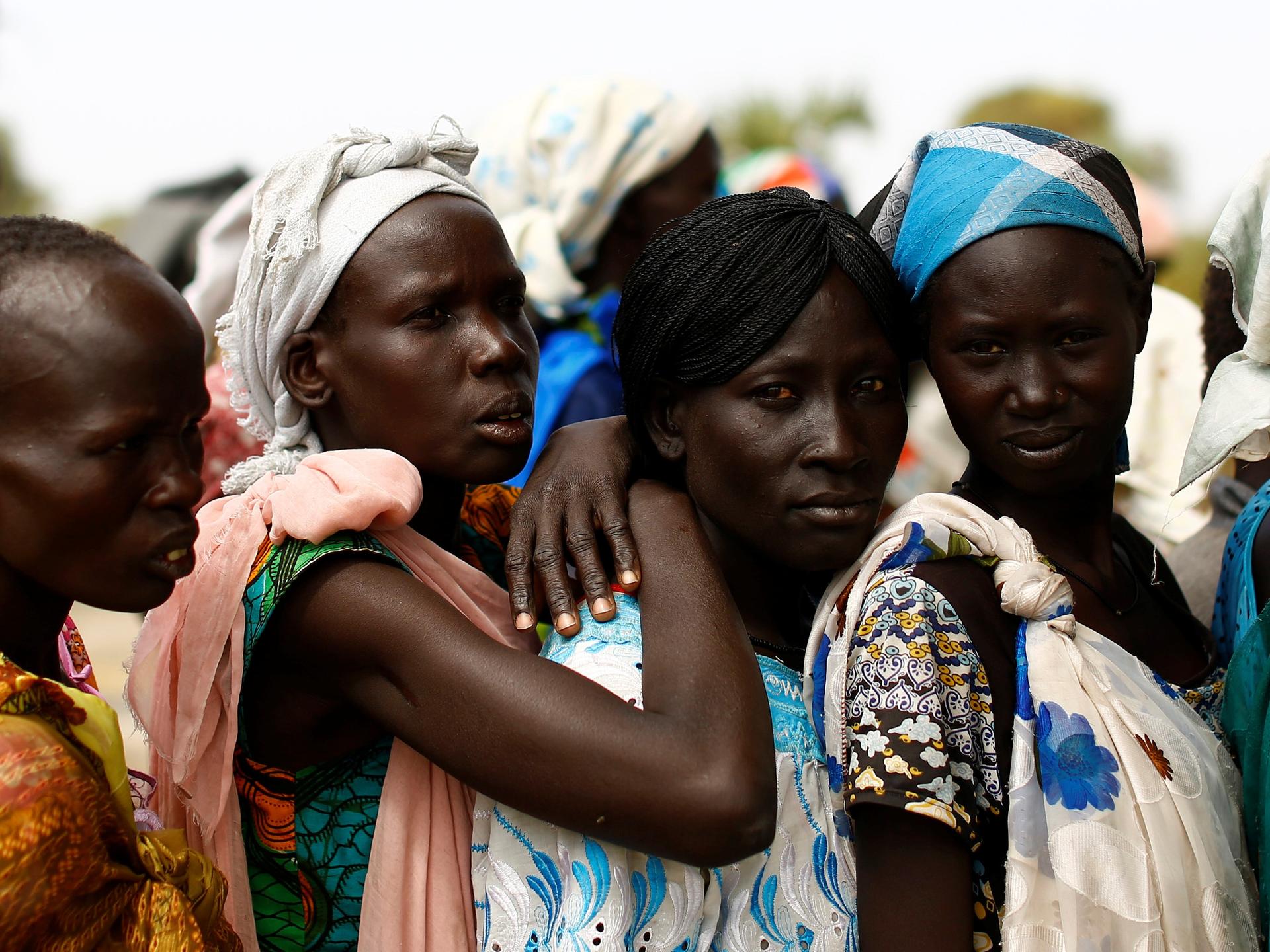 Women wait in line to be seen at a UNICEF supported mobile health clinic, in Rubkuai, Unity State, South Sudan, on February 16, 2017.