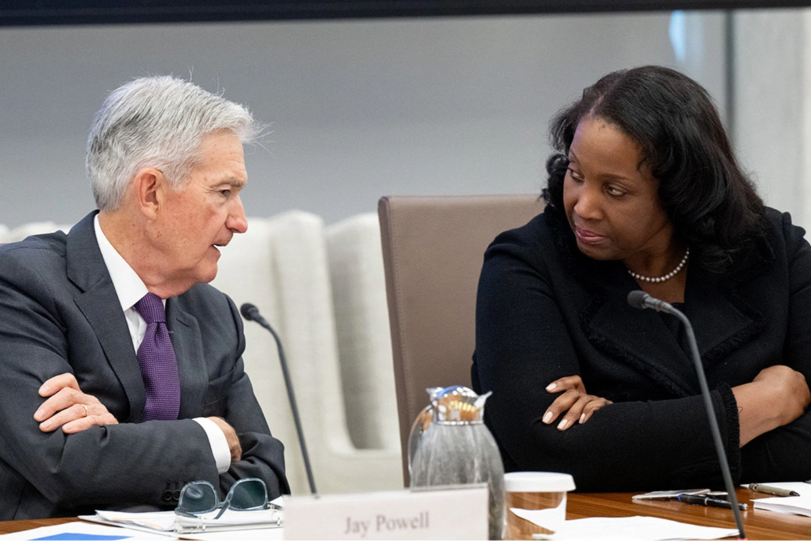Federal Reserve Chair Jerome Powell speaks with Fed Governor Lisa Cook during a board meeting, June 25, 2025. Saul Loeb/AFP/Getty Images