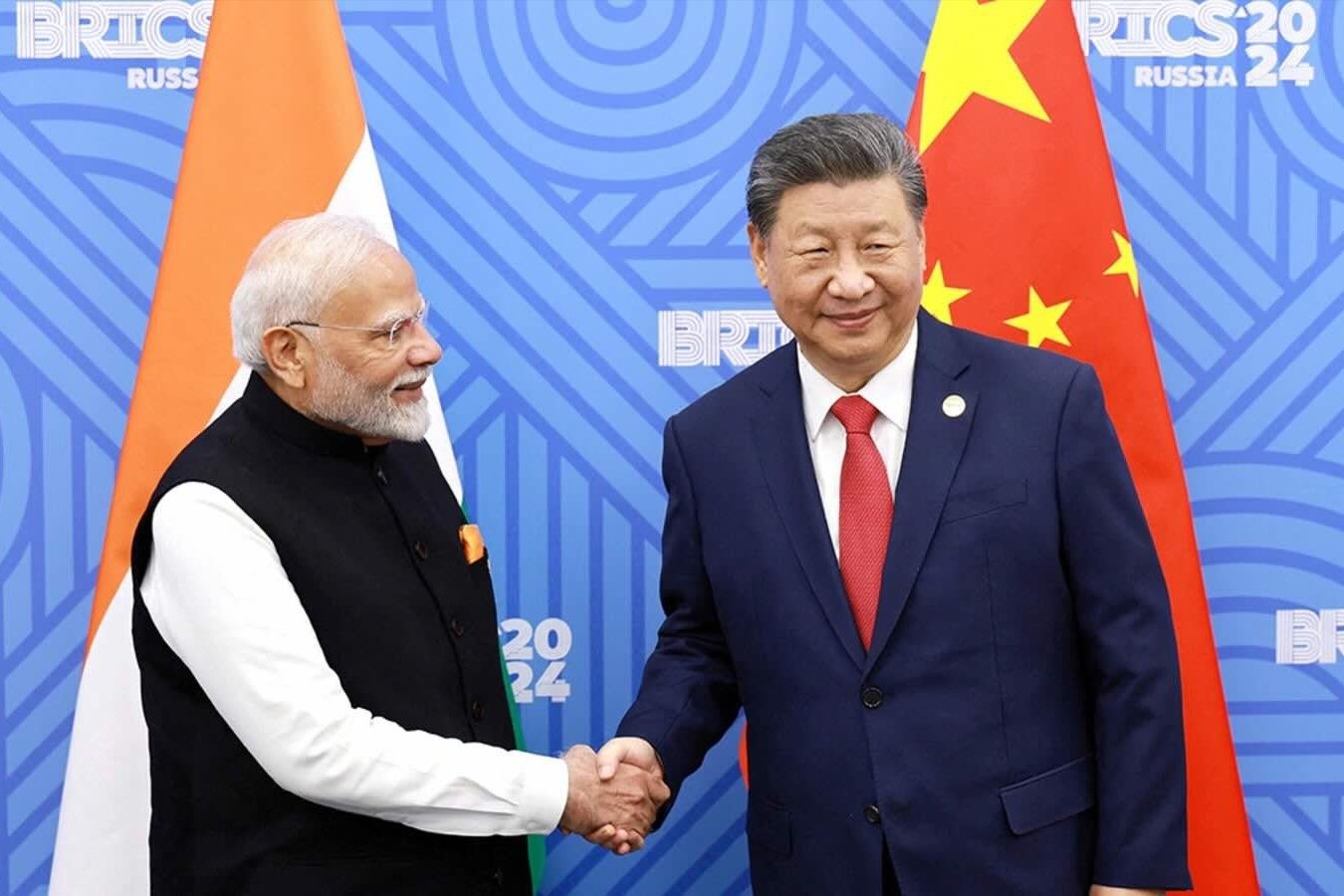 Indian Prime Minister Narendra Modi and Chinese President Xi Jinping meet on the sidelines of the BRICS summit in Kazan, Russia, October 23, 2024. 