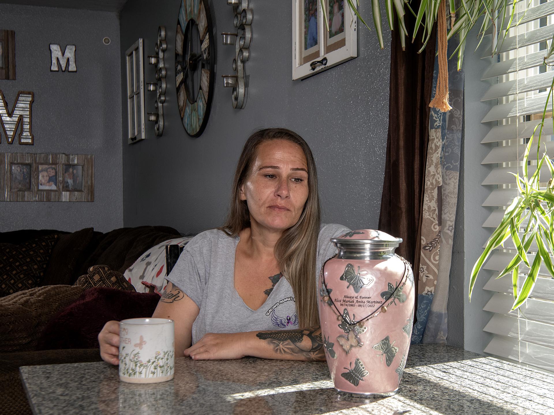 Silvia Martinez sits in her kitchen with her daughter Alize’ urn on August 10, 2026 in Wichita Falls, Texas. Alizé passed in 2022 to an overdose. She was 19 years old.