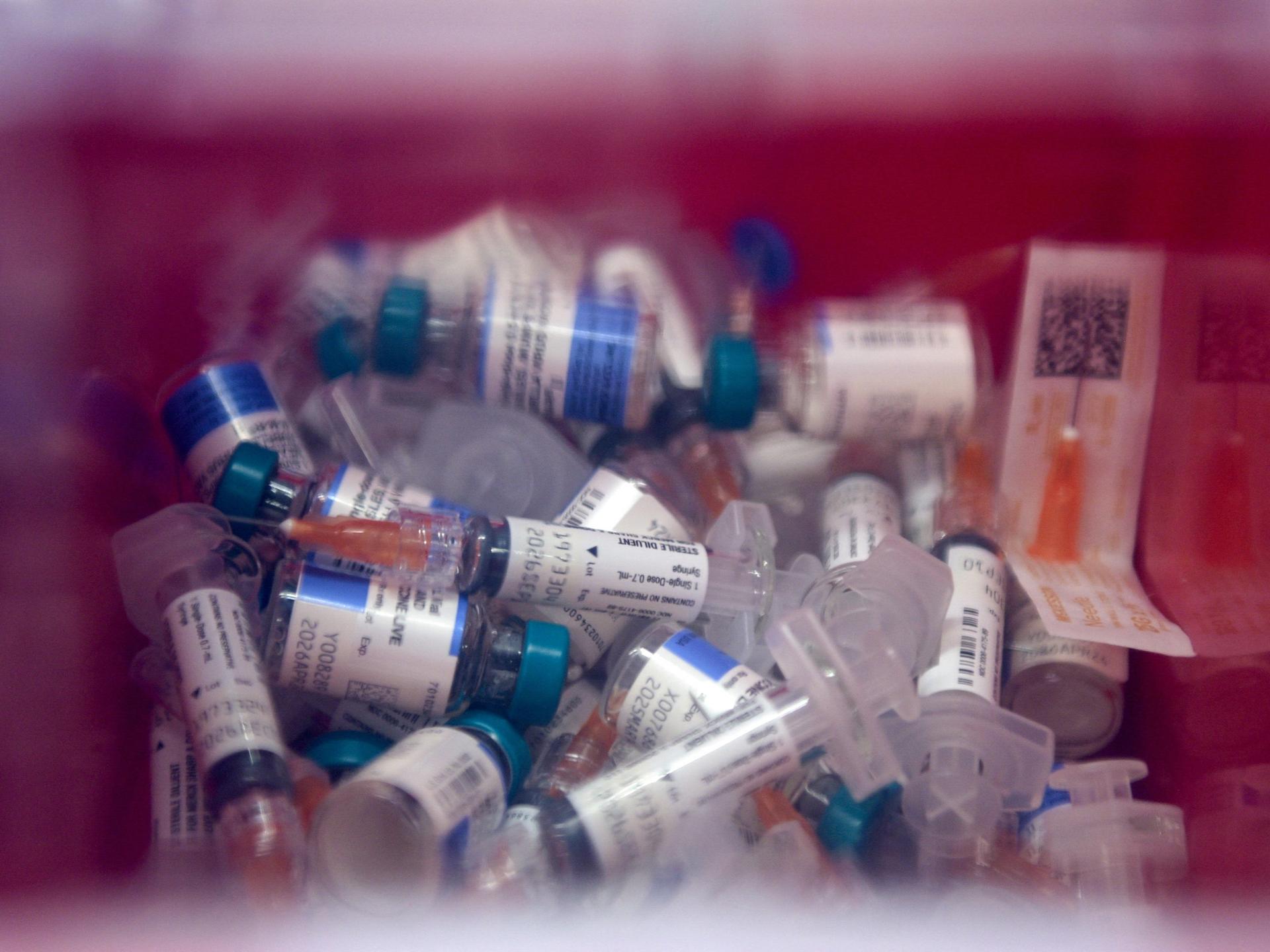 Used MMR vaccines are pictured in a sharps container at the City of Lubbock Health Department, in Lubbock, Texas, on February 27, 2025. 