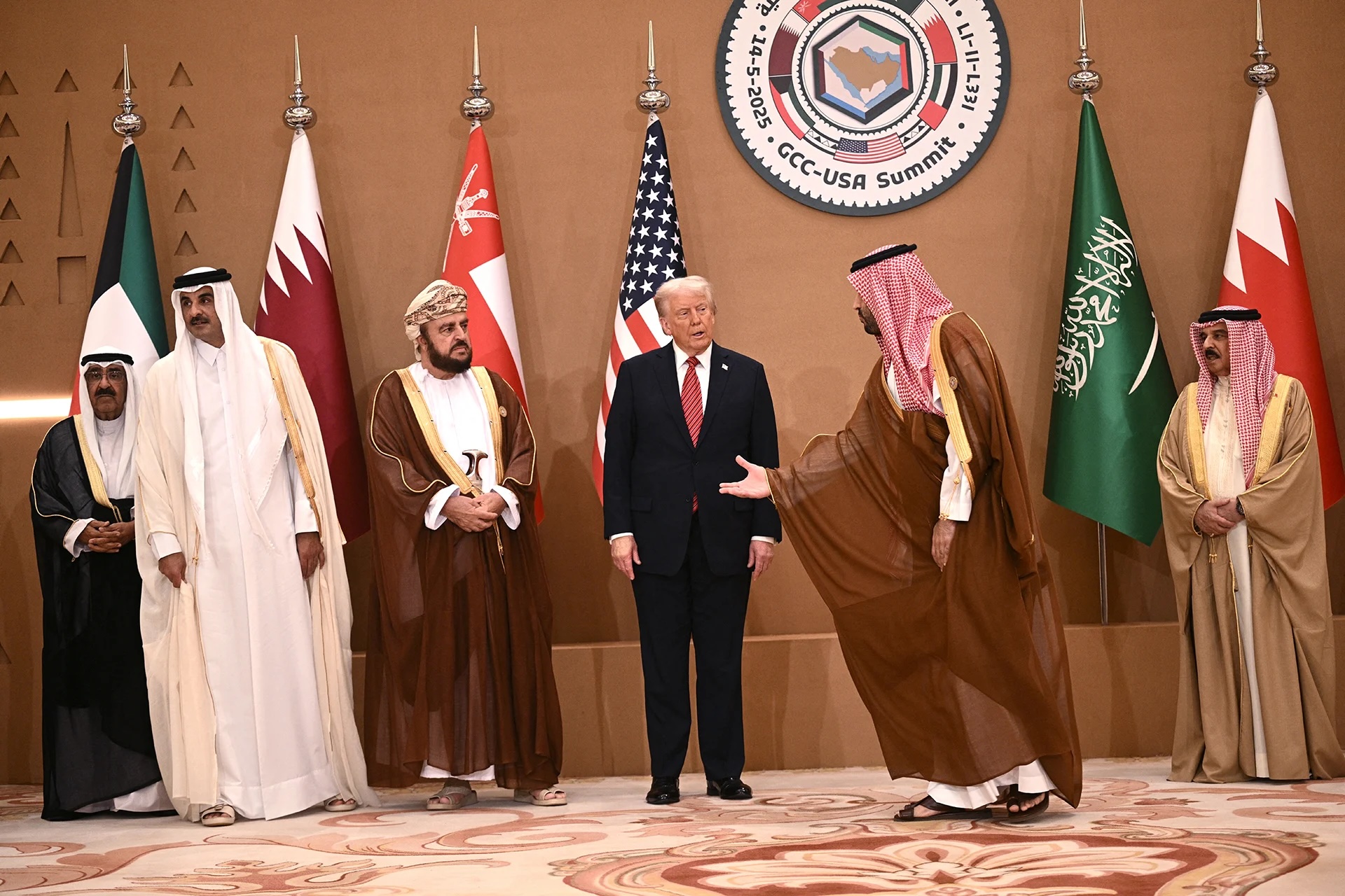 U.S. President Donald Trump poses with Gulf leaders and officials during the Gulf Cooperation Council summit in Riyadh on May 14, 2025. 
