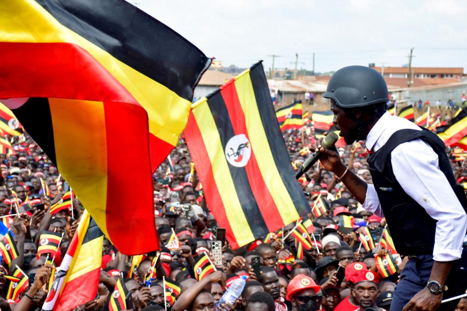 Ugandan Presidential candidate Robert Kyagulanyi, also known as Bobi Wine, of the National Unity Platform party, addresses his supporters during a campaign rally ahead of the general elections in Kampala, Uganda on December 15, 2025.