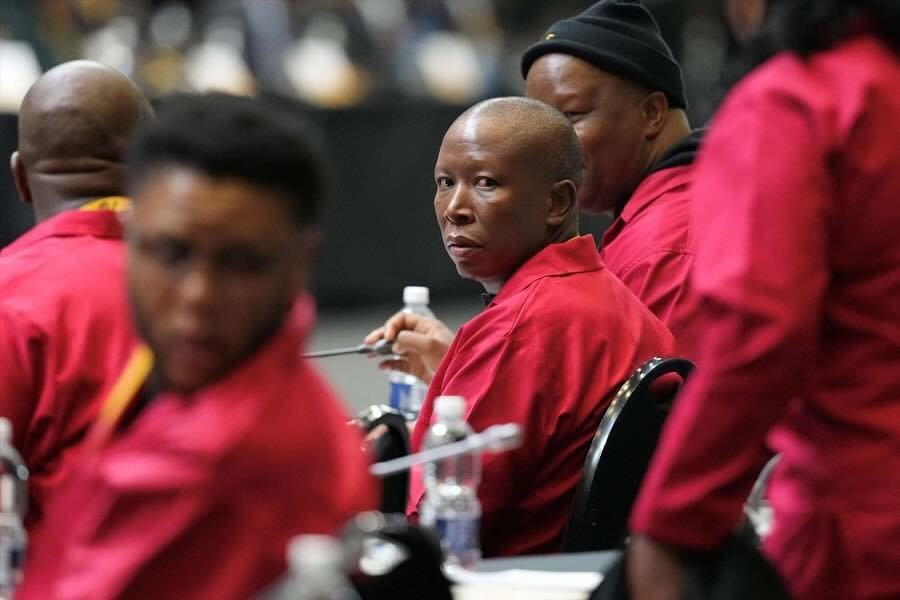Leader of the Economic Freedom Fighters Julius Malema attends the first sitting of the National Assembly following elections at the Cape Town International Convention Center, in Cape Town, South Africa, on June 14, 2024. 