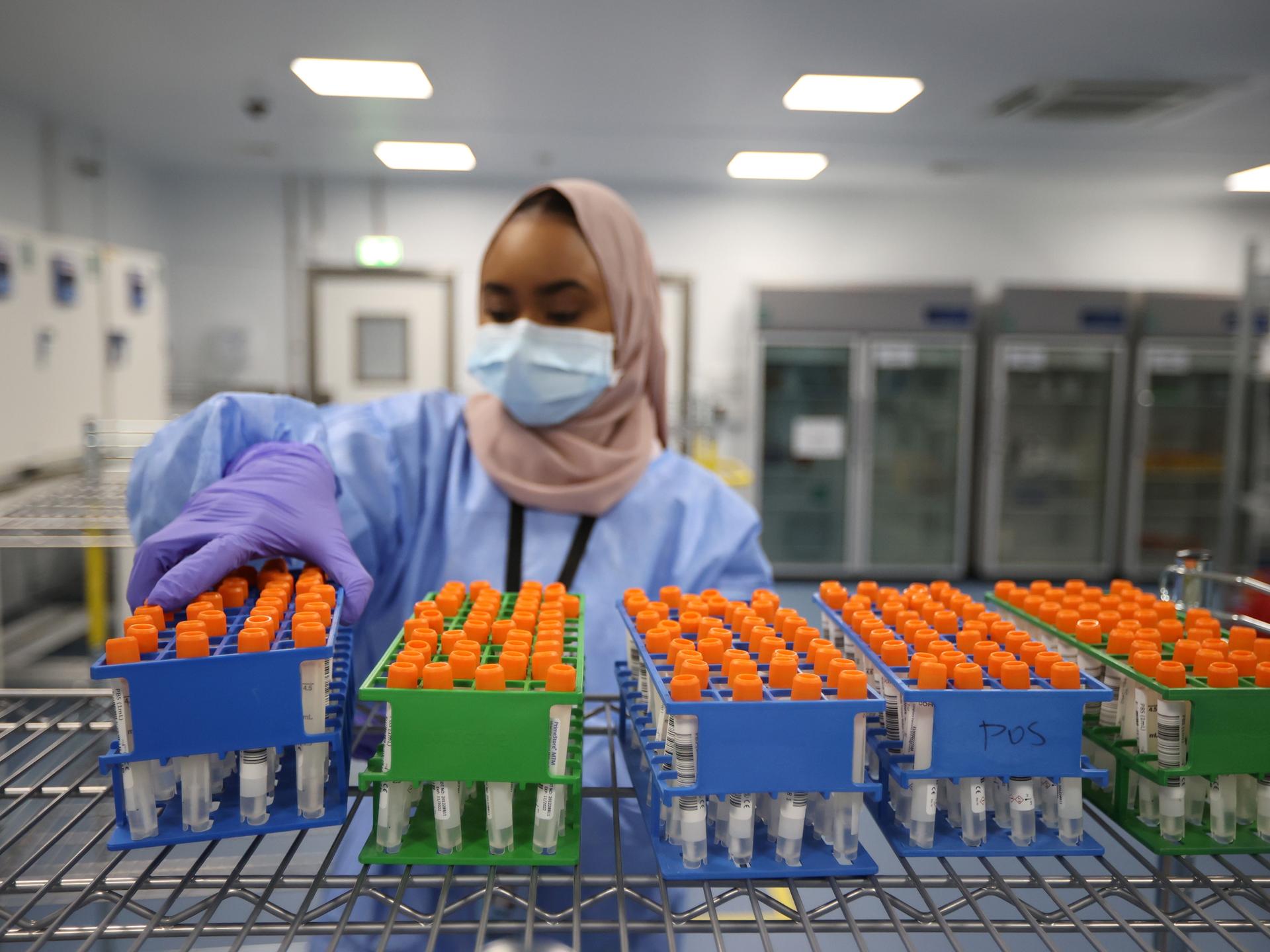 Parents and students arrive for the first day of school, as teachers and volunteers patrol for the presence of Immigration and Customs Enforcement (ICE), at the Ninety-Third Street Elementary School, in Los Angeles, California, on August 14, 2025.