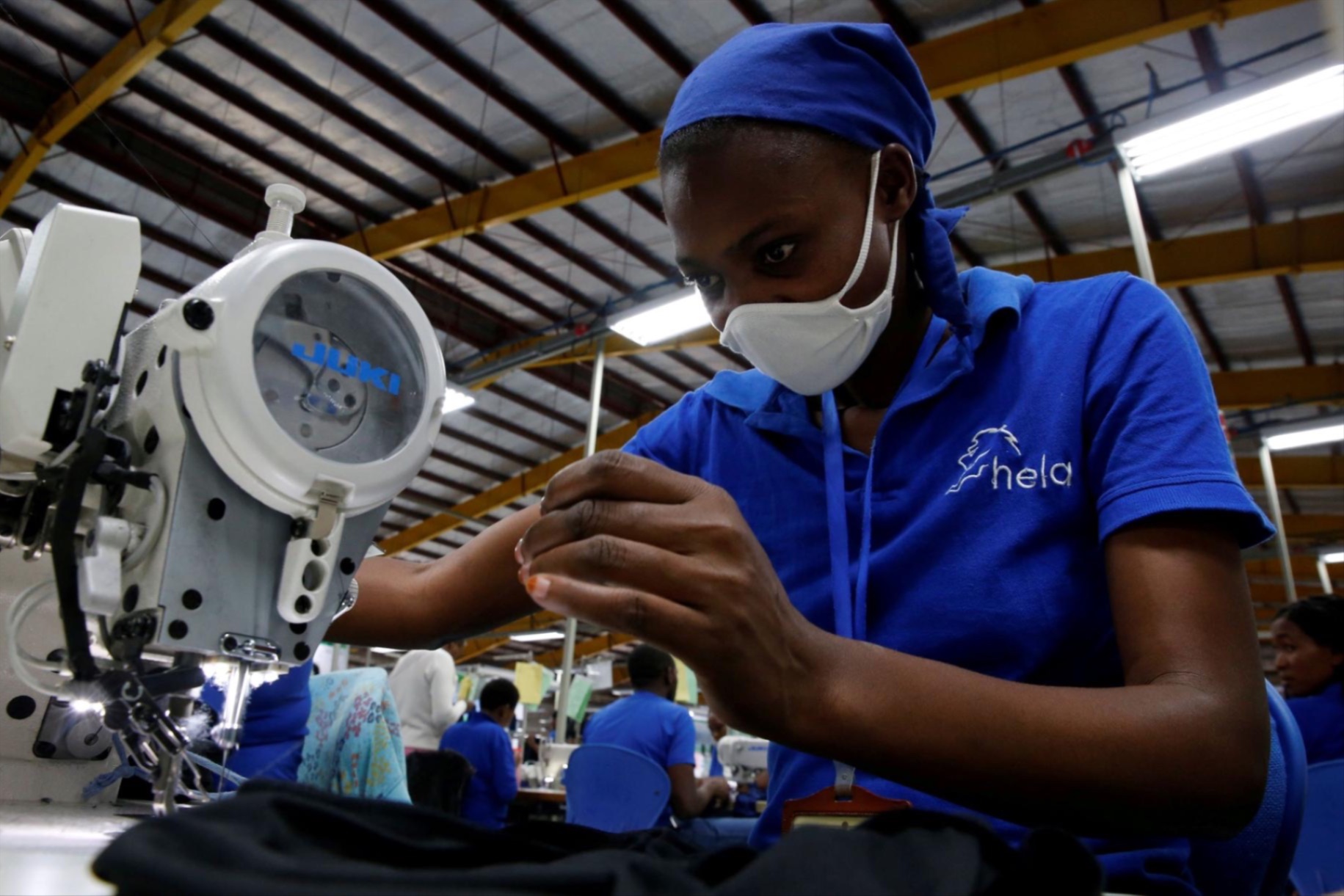 A worker sews at an export processing zone factory in Athi River, Kenya.