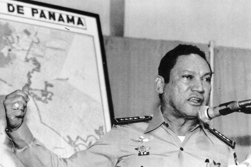 Panamanian General Manuel Noriega addresses a group at the International Conference against U.S. Intervention on November 29, 1989. 