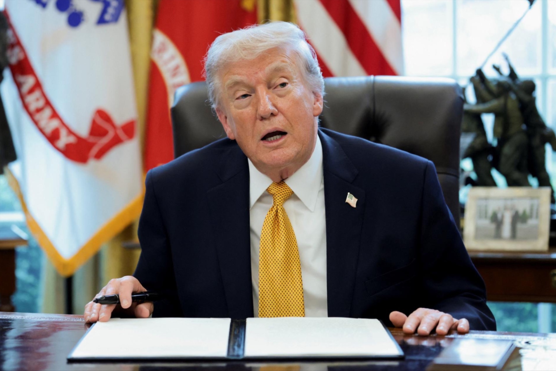 President Donald Trump speaks during an event in the Oval Office at the White House in Washington, D.C., U.S., March 16, 2026. 