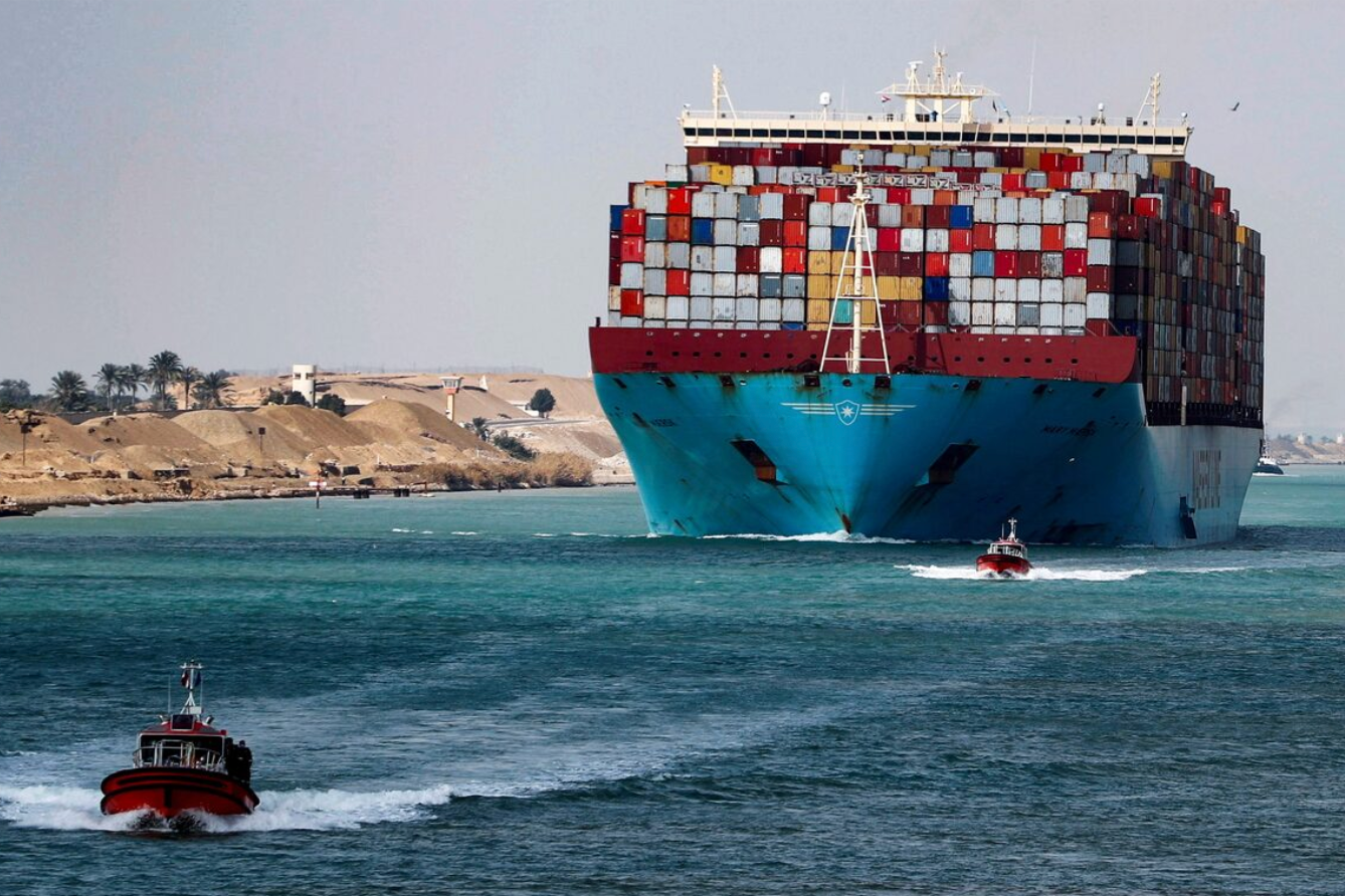 A shipping container passes through the Suez Canal in Suez, Egypt February 15, 2022. Picture taken February 15, 2022. REUTERS/Mohamed Abd El Ghany