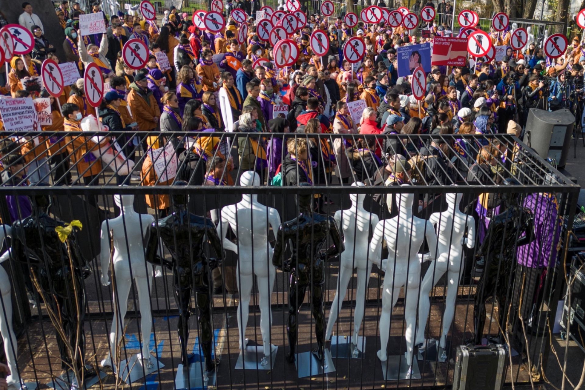 People hold a rally under the slogan 
