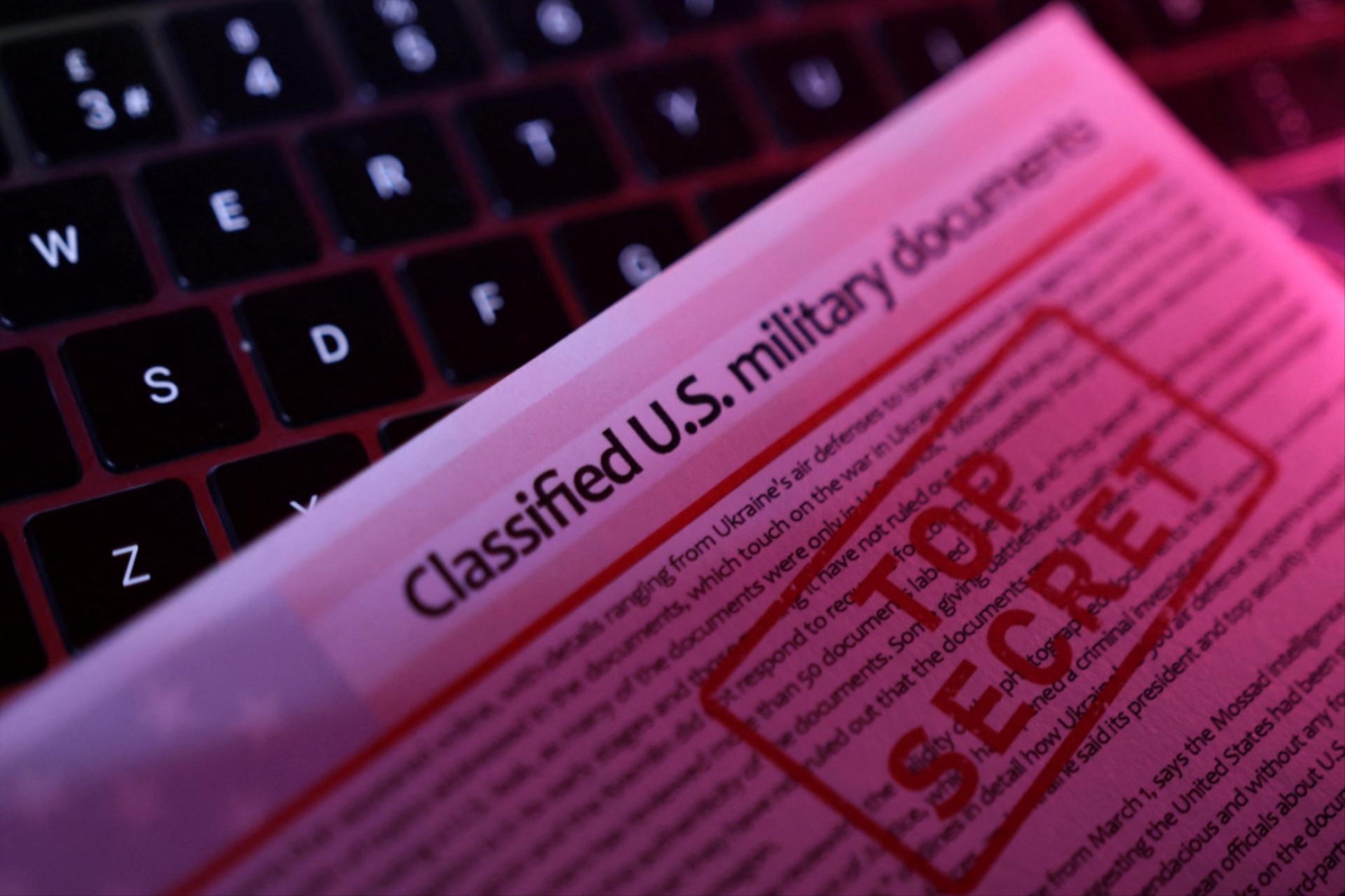  A mockup representation of classified U.S. military documents and a keyboard are seen in this illustration taken April 13, 2023.