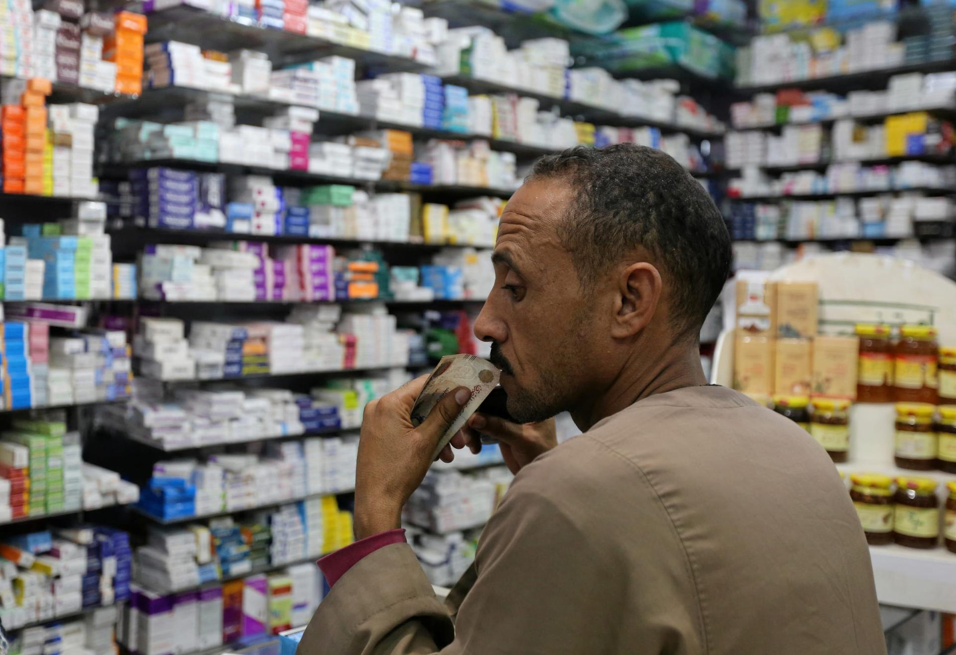 A customer waits for his medicine in a pharmacy, in downtown Cairo, Egypt, on November 17, 2016.  REUTERS/Mohamed Abd El Ghany