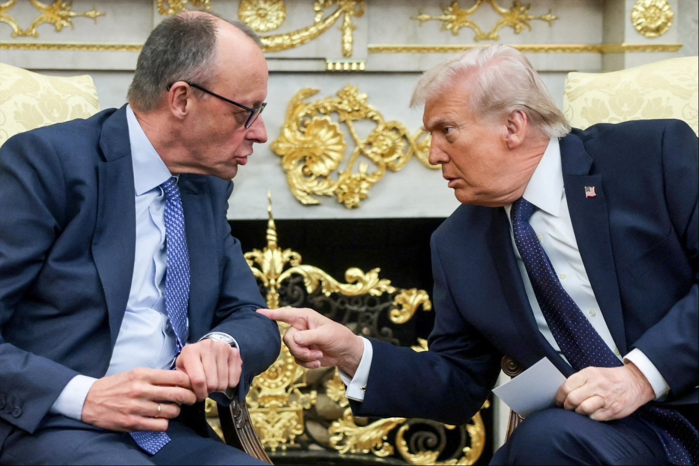 U.S. President Donald Trump and German Chancellor Friedrich Merz meet in the Oval Office at the White House in Washington, D.C., on March 3, 2026. 