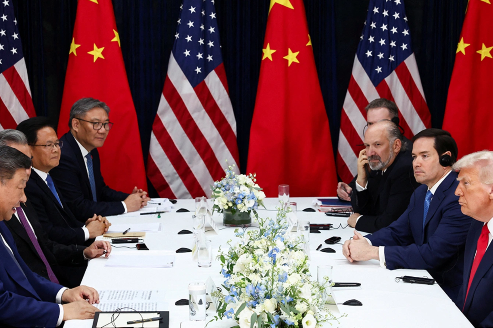 President Donald Trump and other U.S. officials meet with their Chinese counterparts on the sidelines of the APEC summit in Busan, South Korea, October 30, 2025. Evelyn Hockstein/Reuters