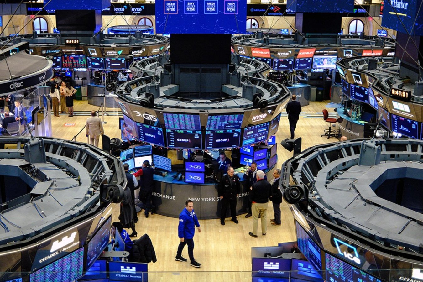 Traders work on the floor of the New York Stock Exchange on December 16, 2025. Charly Triballeau/AFP/Getty Images