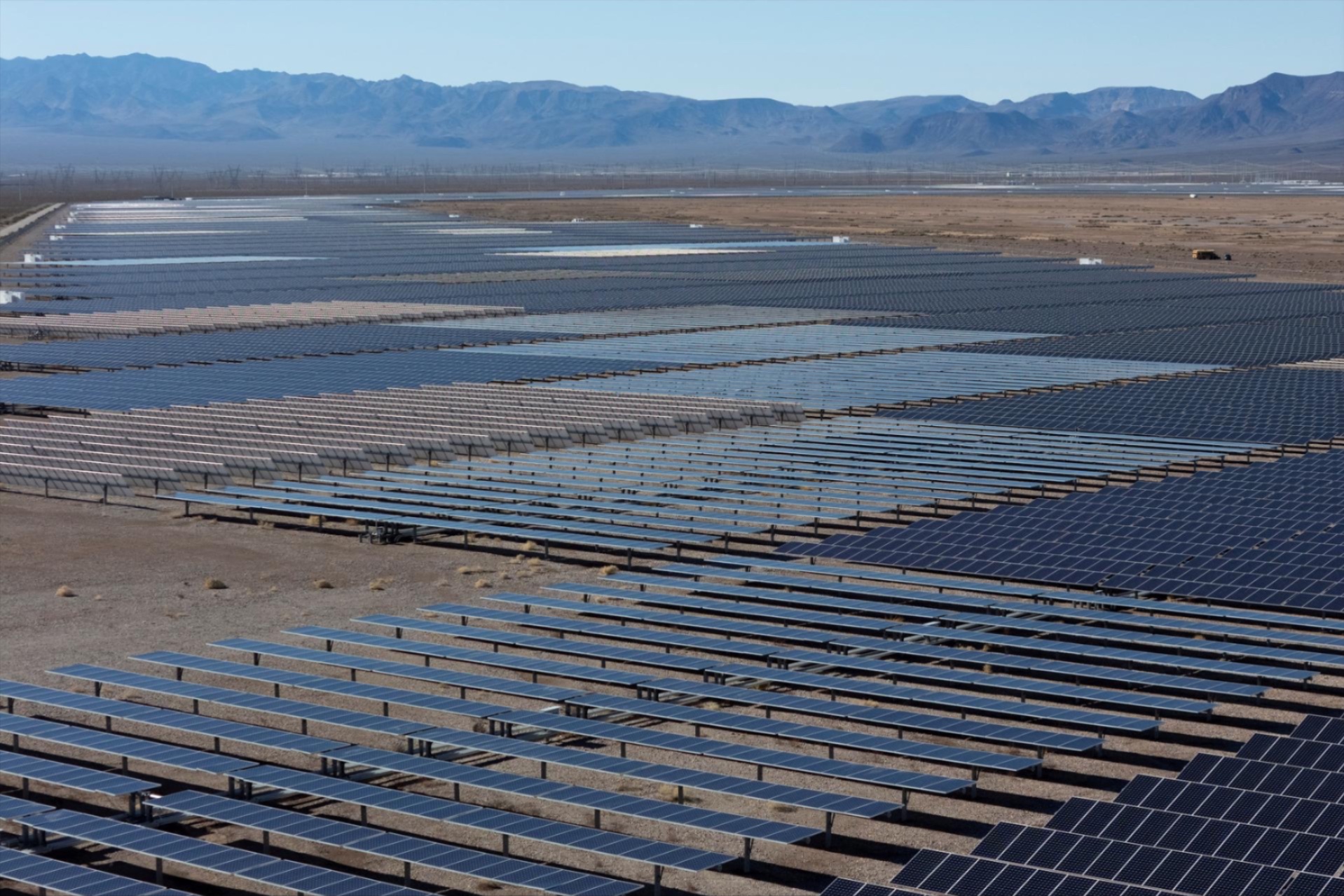 A drone view of solar panels sitting in the sunlight at the Boulder Solar 1 facility in Boulder City, Nevada, U.S., November 23, 2025.
