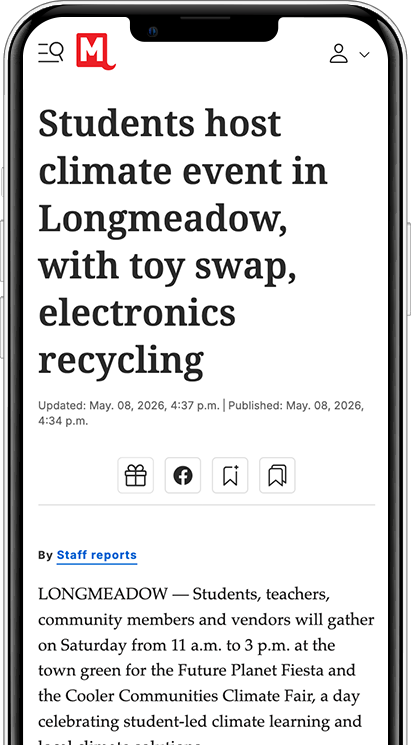 mobile phone with image of news article