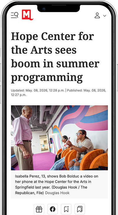 mobile phone with image of news article
